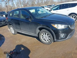 2014 Mazda CX-5 Sport with VIN JM3KE2BE7E0313978, listed as a IAAI auction lot 41437144 with 161,181 mi miles and . Bid and sale history available at carsss.com. Image 1.