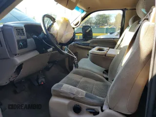 2001 Ford F-250 XL with VIN 1FTNX21SX1EA80232, listed as a Copart auction lot 56067955 with 188,119 mi miles and Salvage title. Bid and sale history available at DreamBid. Image 7.