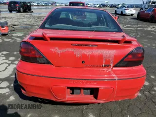 1999 Pontiac Grand Am GT1 with VIN 1G2NW52E5XM768638, listed as a Copart auction lot 49077115 with 113,018 mi miles and Salvage Title. Bid and sale history available at carsss.com. Image 6.