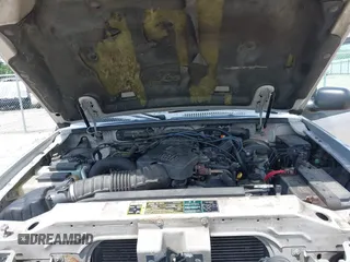 2004 Ford Explorer Sport Trac XLS z VIN 1FMZU77K64UA98358, wystawiony jako IAAI lot #42637743 z przebiegiem 158 359 mil mil oraz . Historia ofert i sprzedaży dostępna na DreamBid. Obrazek 10.