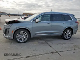 2023 Cadillac XT6 FWD Premium Luxury with VIN 1GYKPCRS2PZ172282, listed as a Copart auction lot 46118325 with 24,510 mi miles and Clean Title. Bid and sale history available at carsss.com. Image 1.