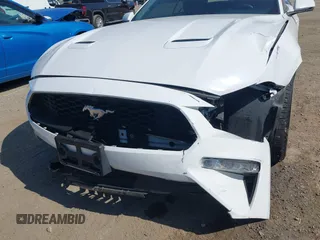 2020 Ford Mustang EcoBoost z VIN 1FATP8UH0L5105965, wystawiony jako IAAI lot #42475841 z przebiegiem 68 999 mil mil oraz . Historia ofert i sprzedaży dostępna na DreamBid. Obrazek 6.