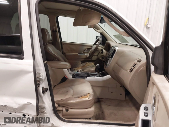 2006 Mercury Mariner Luxury с VIN 4M2YU57116DJ03832, выставлен на аукционе IAAI как лот 41790719 с пробегом 161 978 миль миль и . История ставок и продаж доступна на DreamBid. Изображение 5.