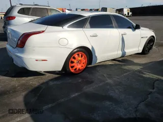 2014 Jaguar XJ with VIN SAJWA2GZ9E8V71794, listed as a Copart auction lot 74347574 with 106,172 mi miles and Clean Title. Bid and sale history available at carsss.com. Image 3.
