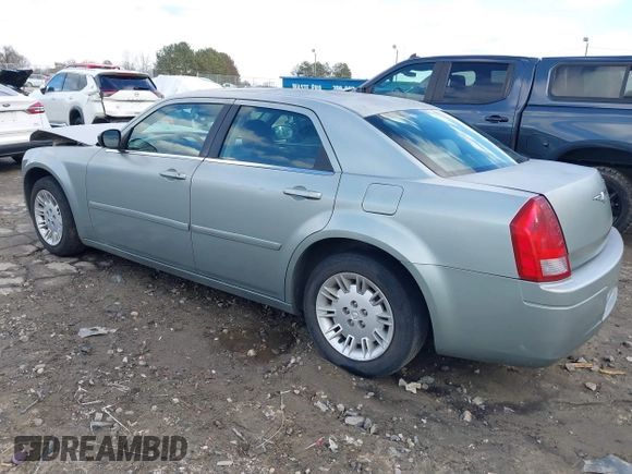 2005 Chrysler 300 with VIN 2C3JA43R05H137403, listed as a IAAI auction lot 41399519 with 135,044 mi miles. Bid and sale history available at carsss.com. Image 3.