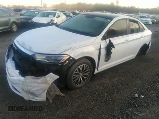 2021 Volkswagen Jetta S z VIN 3VWC57BU1MM017025, wystawiony jako IAAI lot #31656882 z przebiegiem 20 664 mil mil oraz . Historia ofert i sprzedaży dostępna na DreamBid. Obrazek 2.