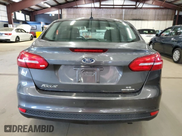 2015 Ford Focus SE with VIN 1FADP3F2XFL249619, listed as a Copart auction lot 63705825 with 118,573 mi miles and Clean title. Bid and sale history available at DreamBid. Image 6.