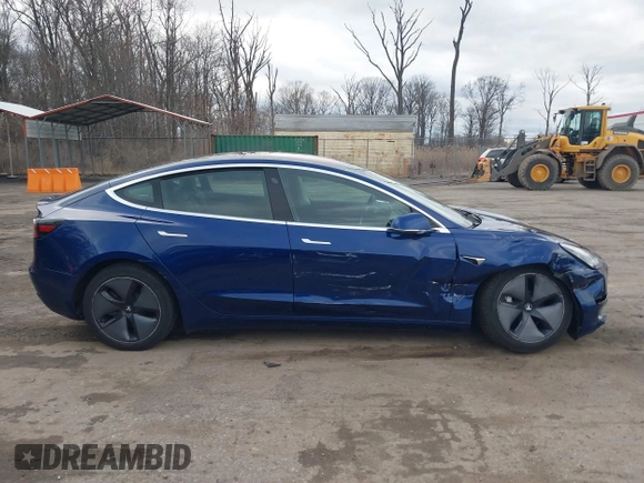 2019 Tesla Model 3 Mid Range with VIN 5YJ3E1EA5KF299589, listed as a IAAI auction lot 41709733 with 50,256 mi miles and . Bid and sale history available at DreamBid. Image 14.