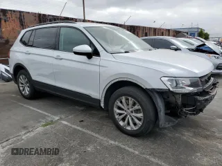 2018 Volkswagen Tiguan S with VIN 3VV1B7AXXJM013468, listed as a Copart auction lot 58371875 with 61,464 mi miles and Salvage title. Bid and sale history available at DreamBid. Image 4.