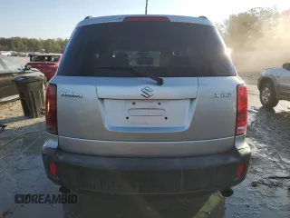 2007 Suzuki XL7 with VIN 2S3DB117476127947, listed as a Copart auction lot 74905504 with 136,091 mi miles and Salvage title. Bid and sale history available at DreamBid. Image 6.
