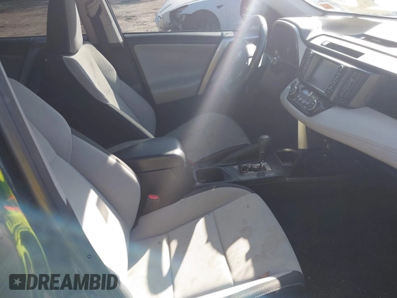 2018 Toyota RAV4 XLE with VIN JTMWFREV5JJ739619, listed as a IAAI auction lot 42017343 with 126,810 mi miles and . Bid and sale history available at DreamBid. Image 5.