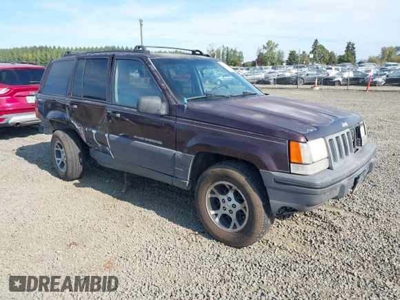 1996 Jeep Grand Cherokee Laredo with VIN 1J4GZ58S2TC262980, listed as a IAAI auction lot 41949514 with 269,674 mi miles and . Bid and sale history available at DreamBid. Image 1.