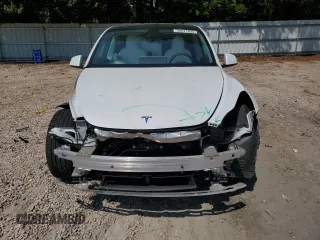 2022 Tesla Model Y Long Range z VIN 7SAYGDEE1NF354633, wystawiony jako Copart lot #55221835 z przebiegiem 53 821 mil mil oraz Szkoda całkowita • Salvage title. Historia ofert i sprzedaży dostępna na DreamBid. Obrazek 5.