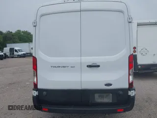 2019 Ford Transit z VIN 1FTYE2CMXKKB67987, wystawiony jako IAAI lot #42314124 z przebiegiem 46 021 mil mil oraz . Historia ofert i sprzedaży dostępna na DreamBid. Obrazek 16.