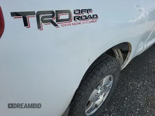 2011 Toyota Tundra with VIN 5TFUY5F1XBX198815, listed as a IAAI auction lot 42571444 with 281,114 mi miles and . Bid and sale history available at DreamBid. Image 36.