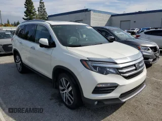2017 Honda Pilot Touring with VIN 5FNYF6H91HB080607, listed as a Copart auction lot 49119715 with 61,490 mi miles and Salvage Title. Bid and sale history available at carsss.com. Image 4.