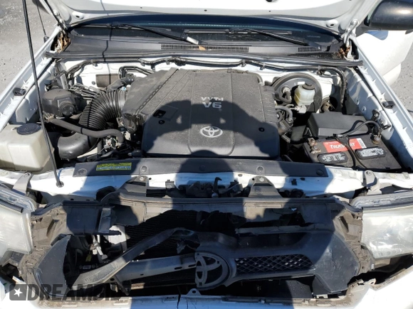 2012 Toyota Tacoma PreRunner z VIN 5TFTU4GNXCX018348, wystawiony jako Copart lot #88088425 z przebiegiem 77 653 mil mil oraz Szkoda całkowita • Salvage title. Historia ofert i sprzedaży dostępna na DreamBid. Obrazek 13.