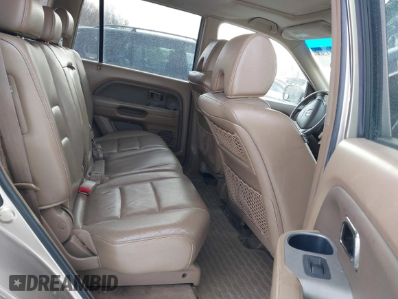 2006 Honda Pilot EX-L with VIN 2HKYF18526H546575, listed as a IAAI auction lot 41414263 with 118,872 mi miles and . Bid and sale history available at DreamBid. Image 8.