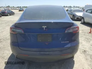 2022 Tesla Model Y Performance z VIN 7SAYGDEF6NF337710, wystawiony jako Copart lot #60200985 z przebiegiem 101 168 mil mil oraz Szkoda całkowita • Salvage title. Historia ofert i sprzedaży dostępna na DreamBid. Obrazek 6.