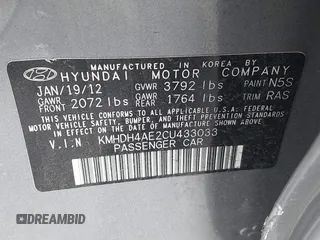 2012 Hyundai Elantra Limited with VIN KMHDH4AE2CU433033, listed as a IAAI auction lot 42006893 with 124,892 mi miles. Bid and sale history available at carsss.com. Image 9.