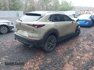 2024 Mazda CX-30 2.5 Carbon Turbo with VIN 3MVDMBXY1RM619079, listed as a IAAI auction lot 41063941 with 11,010 mi miles. Bid and sale history available at carsss.com. Image 4.