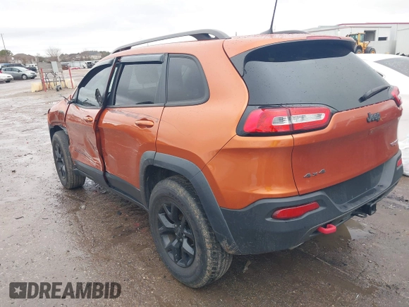2016 Jeep Cherokee Trailhawk z VIN 1C4PJMBS0GW155379, wystawiony jako IAAI lot #41472352 z przebiegiem 116 036 mil mil oraz . Historia ofert i sprzedaży dostępna na DreamBid. Obrazek 3.