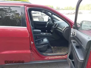 2014 Jeep Grand Cherokee Limited with VIN 1C4RJFBG8EC553860, listed as a IAAI auction lot 42452419 with 174,274 mi miles and . Bid and sale history available at DreamBid. Image 5.