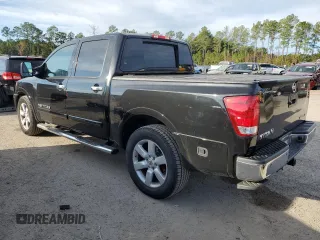 2015 Nissan Titan SV with VIN 1N6BA0ED9FN509000, listed as a Copart auction lot 81986934 with 121,338 mi miles and Salvage title. Bid and sale history available at DreamBid. Image 2.