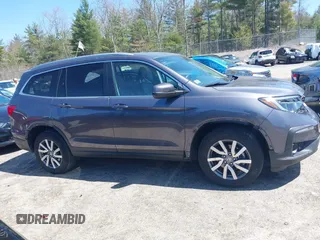 2021 Honda Pilot EX-L with VIN 5FNYF6H59MB016354, listed as a IAAI auction lot 42108020 with 61,436 mi miles and . Bid and sale history available at DreamBid. Image 14.