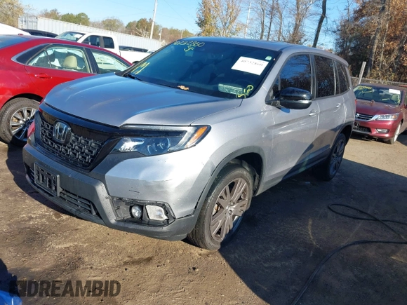 2021 Honda Passport EX-L with VIN 5FNYF8H54MB042677, listed as a IAAI auction lot 40732860 with 63,698 mi miles and . Bid and sale history available at DreamBid. Image 17.