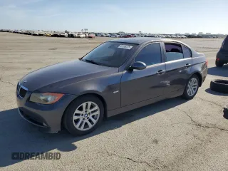 2007 BMW 3 Series 328i with VIN WBAVC53507FZ78018, listed as a Copart auction lot 59165475 with 184,326 mi miles and Salvage title. Bid and sale history available at DreamBid. Image 1.