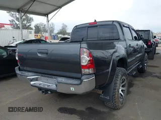 2015 Toyota Tacoma with VIN 3TMLU4EN8FM167337, listed as a IAAI auction lot 42117662 with 60,929 mi miles. Bid and sale history available at carsss.com. Image 4.