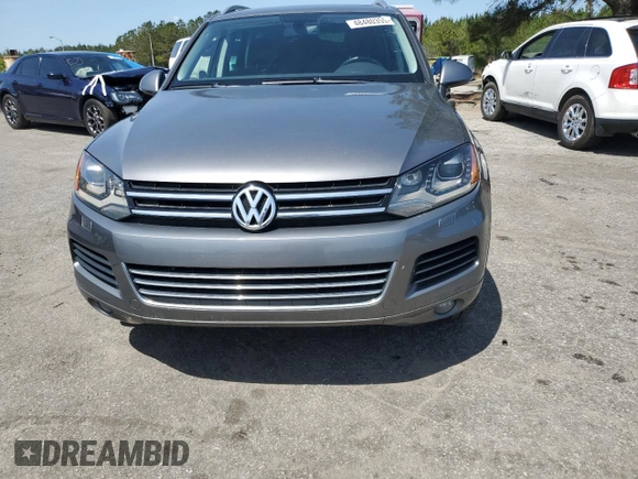 2012 Volkswagen Touareg Sport with VIN WVGEF9BP0CD010197, listed as a Copart auction lot 48480355 with 131,605 mi miles and Salvage Title. Bid and sale history available at DreamBid. Image 5.