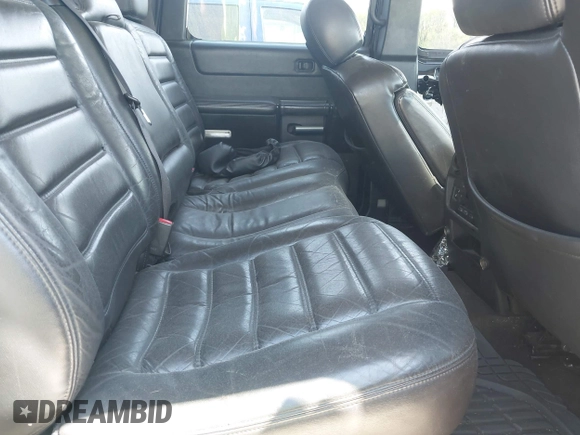 2005 Hummer H2 SUV z VIN 5GRGN23U25H128791, wystawiony jako IAAI lot #42115436 z przebiegiem 286 818 mil mil oraz . Historia ofert i sprzedaży dostępna na DreamBid. Obrazek 8.