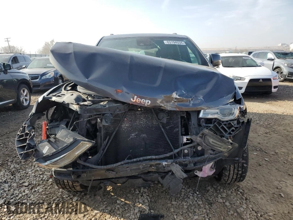 2019 Jeep Grand Cherokee Summit with VIN 1C4RJFJG9KC749707, listed as a Copart auction lot 83194534 with 111,566 mi miles and Salvage Title. Bid and sale history available at carsss.com. Image 5.