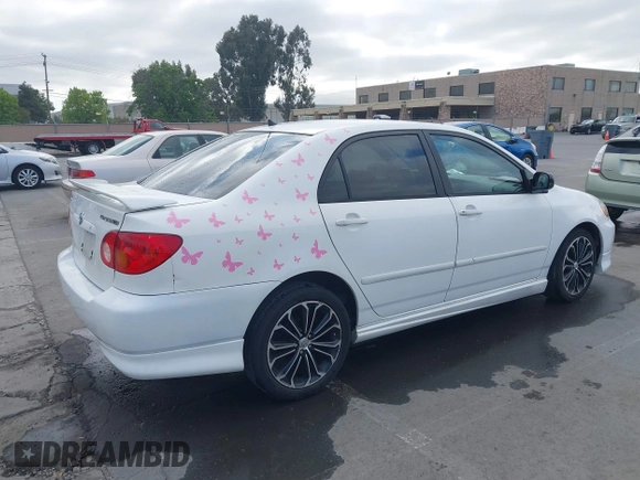 2004 Toyota Corolla CE with VIN JTDBR32E440052035, listed as a IAAI auction lot 42218301 with 299,999 mi miles. Bid and sale history available at carsss.com. Image 4.