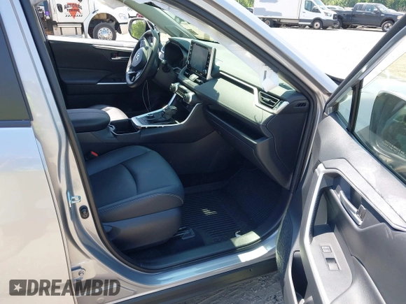 2022 Toyota RAV4 Hybrid XLE Premium with VIN JTMB6RFV1ND063963, listed as a IAAI auction lot 42550907 with 35,012 mi miles and . Bid and sale history available at DreamBid. Image 5.