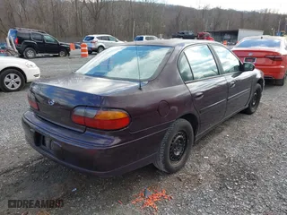 1999 Chevrolet Malibu LS with VIN 1G1NE52J7X6253780, listed as a IAAI auction lot 41723403 with 315,918 mi miles. Bid and sale history available at carsss.com. Image 4.
