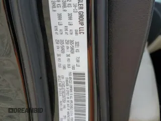 2014 Dodge Durango Citadel z VIN 1C4SDJET6EC267350, wystawiony jako Copart lot #56128585 z przebiegiem 259 339 mil mil oraz Szkoda całkowita • Salvage title. Historia ofert i sprzedaży dostępna na DreamBid. Obrazek 13.