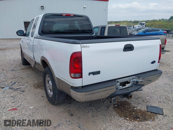 2003 Ford F-150 XL with VIN 1FTRX17L33NB79733, listed as a IAAI auction lot 42023385 with 136,236 mi miles. Bid and sale history available at carsss.com. Image 3.