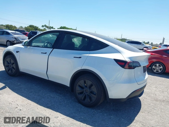 2025 Tesla Model Y Long Range with VIN 7SAYGDED6SF234278, listed as a IAAI auction lot 41781695 with 1,168 mi miles and . Bid and sale history available at DreamBid. Image 3.