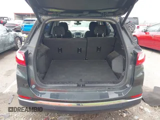 2019 Chevrolet Equinox LT z VIN 2GNAXKEV3K6125060, wystawiony jako IAAI lot #42162180 z przebiegiem 83 100 mil mil oraz . Historia ofert i sprzedaży dostępna na DreamBid. Obrazek 17.
