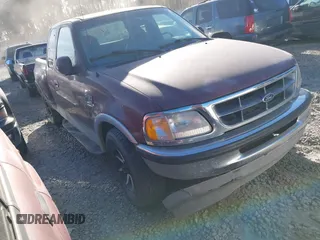 1998 Ford F-150 XL z VIN 1FTRX07L5WKB94377, wystawiony jako IAAI lot #41134154 z przebiegiem 196 229 mil mil oraz . Historia ofert i sprzedaży dostępna na DreamBid. Obrazek 1.