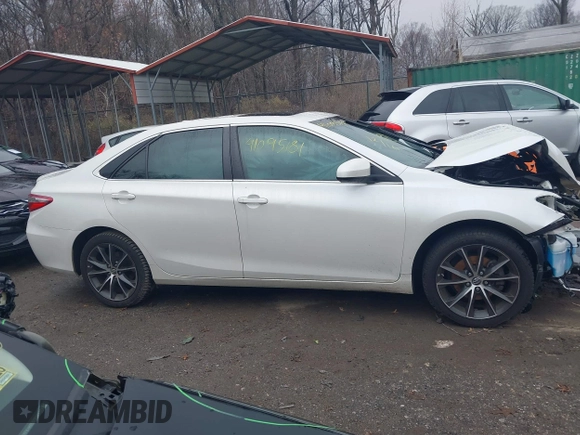 2016 Toyota Camry XSE with VIN 4T1BK1FK2GU571473, listed as a IAAI auction lot 41095181 with 63,677 mi miles. Bid and sale history available at carsss.com. Image 12.