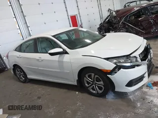 2017 Honda Civic LX with VIN 19XFC2F5XHE007668, listed as a IAAI auction lot 42219927 with 132,444 mi miles and . Bid and sale history available at DreamBid. Image 13.