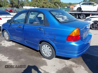 2003 Suzuki Aerio S z VIN JS2RA41SX35171394, wystawiony jako IAAI lot #40612266 z przebiegiem 70 127 mil mil oraz . Historia ofert i sprzedaży dostępna na DreamBid. Obrazek 3.