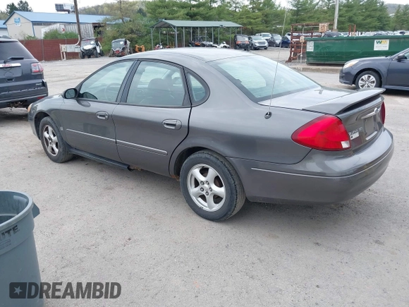 2003 Ford Taurus SES Standard with VIN 1FAFP55S63G176291, listed as a IAAI auction lot 42079514 with 173,623 mi miles. Bid and sale history available at carsss.com. Image 3.