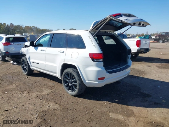 2018 Jeep Grand Cherokee Laredo E with VIN 1C4RJFAGXJC435658, listed as a IAAI auction lot 40659459 with 97,827 mi miles. Bid and sale history available at carsss.com. Image 3.