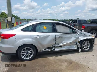 2016 Ford Focus SE with VIN 1FADP3F26GL351775, listed as a IAAI auction lot 42424733 with 164,886 mi miles and . Bid and sale history available at DreamBid. Image 13.