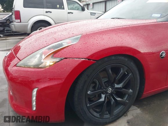 2016 Nissan 370Z z VIN JN1AZ4EHXGM932681, wystawiony jako IAAI lot #42350850 z przebiegiem 94 586 mil mil oraz . Historia ofert i sprzedaży dostępna na DreamBid. Obrazek 6.